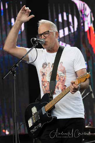 Chris Tait performing on stage